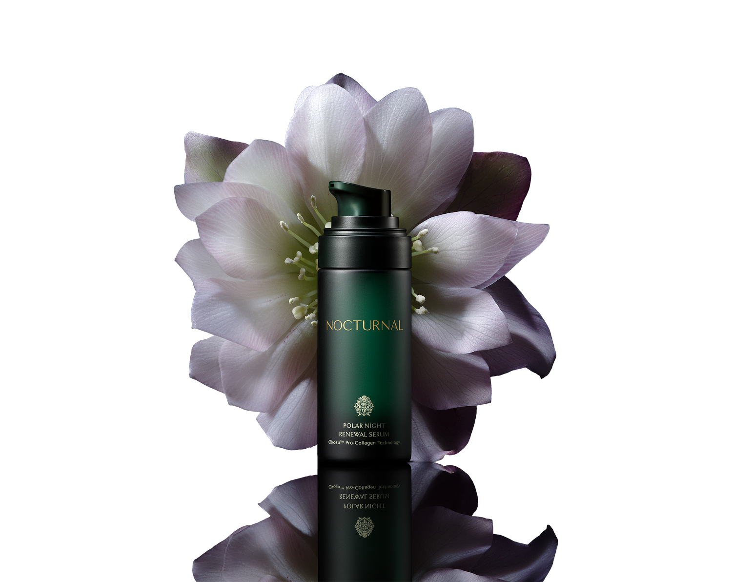 This is full size the Polar Night Anti-aging renewal serum. It is a dark green glass bottle with the cap off. The bottle is sitting in front of a beautiful night blooming flower.