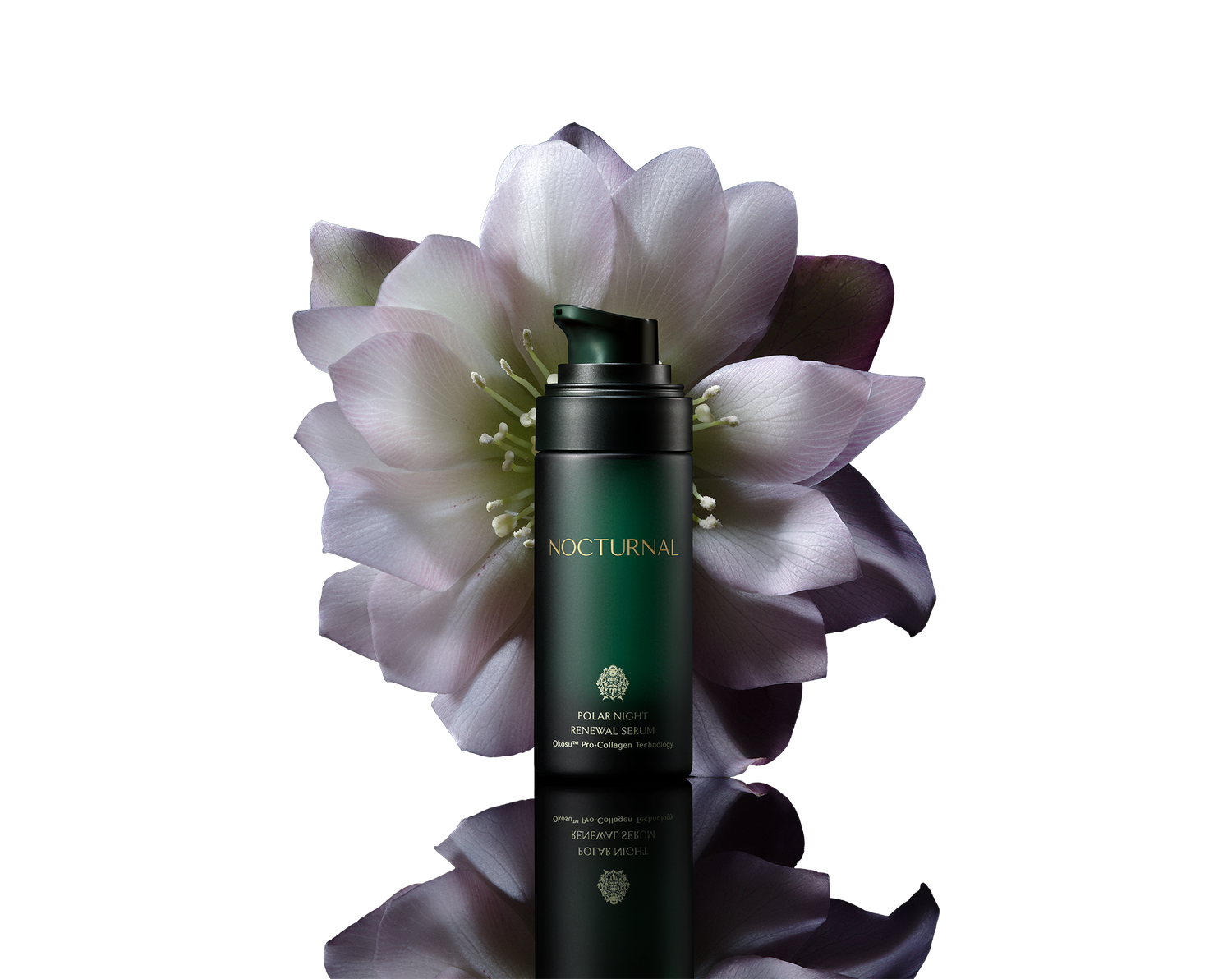 This is full size the Polar Night Anti-aging renewal serum. It is a dark green glass bottle with the cap off. The bottle is sitting in front of a beautiful night blooming flower. 